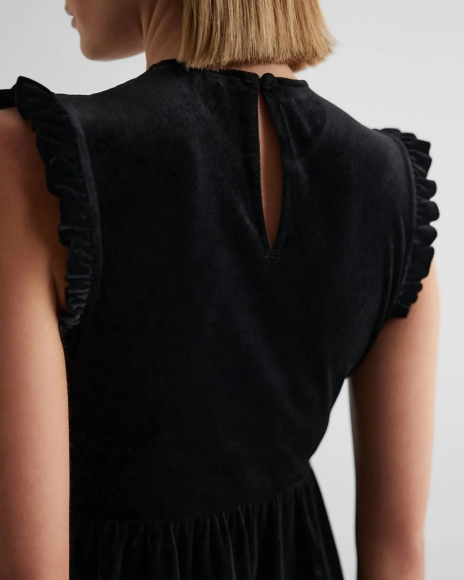 Velvet Peplum Floral Top In Black