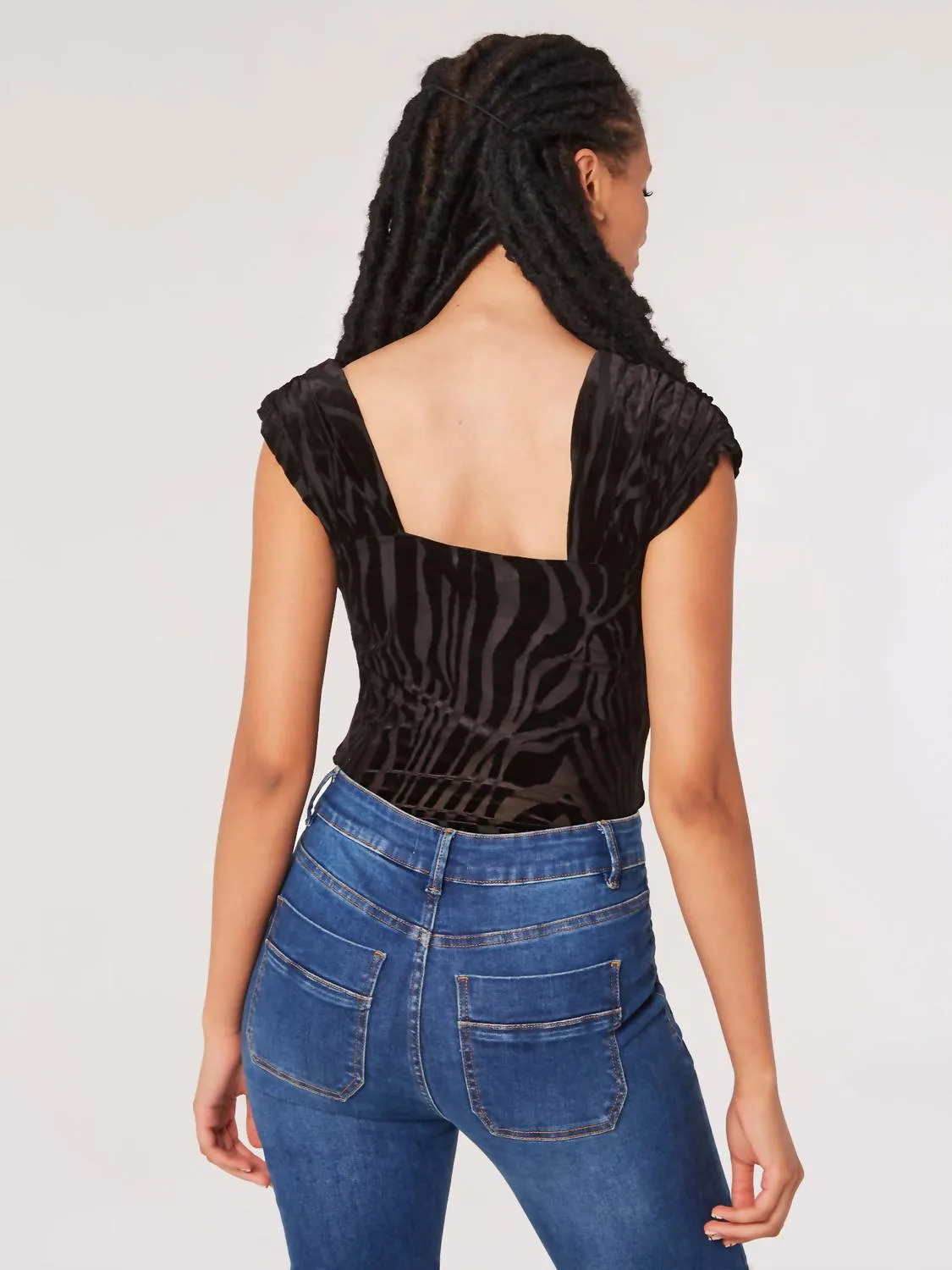Zebra Burnout Bodysuit In Black